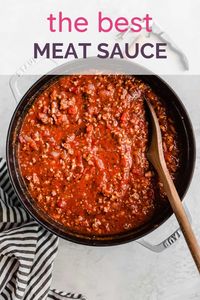 This amazing meat sauce recipe hails from my father-in-law's kitchen and is everyone's favorite. It's thick, hearty, and has phenomenal flavor thanks to a combination of beef, veal, and pork. Sunday dinner approved! #pasta #spaghettisauce