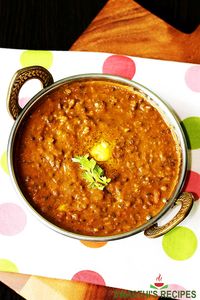 Dal makhani is a popular Indian dish made by simmering black lentils in a buttery, spicy & flavorful masala. Try this amazingly delicious, flavorful and creamy dish this weekend. #indian #dal #curry #dalmakhani #dalmakhanirecipe via @swasthi