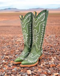 These are the best quality handmade leather boots from Leon, Mexico. All our cowboy boots are made with the finest leather and have a super comfortable outsole. Perfect for special occasions and everyday wear.  Features:  -Color: Green -Toe: Features a snip toe - 2 in Heel - 16 in tall -Features zipper on the side -Genuine Leather Lining -Genuine Leather Insole -Genuine Leather outsole SHIPPING POLICIES Your order will be processed and shipped in 2 - 4 business days. RETURN POLICIES We only accept returns and exchanges if the item is in new, original condition. We don't accept anything worn, used or altered. Buyers are responsible for the return shipping costs. The shipping costs are not refundable.