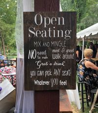 Congratulations!!  Now it's time to start planning your perfect day! If seating isn't your thing, here's a great sign for open seating.  Let everyone know they can come and go as they please, mingle and just have fun! -Sign is roughly 10"x15" -Early American stained wood -White, vinyl lettering Custom orders are always welcome!   Depending on the changes, prices may vary - i.e. stain, sizing, changing of words Message me and we can start your sign today!