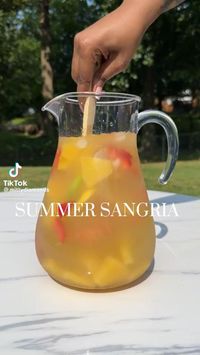 Great for your 4th of july BBQ! Easy crowd hit! Click to get the perfect sangria jar for this recipe