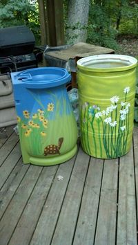 (Pb) Garden: Let it Rain! on Pinterest | @djohnisee ~ PIC: DIY recycle and save RAIN WATER ~ Painted rain barrels ~ NOTE: Krylon Fusion for Plastic® Rust-oleum or Valspar plasic paint / primer ~ are some of the best products to use when spray painting plastic.