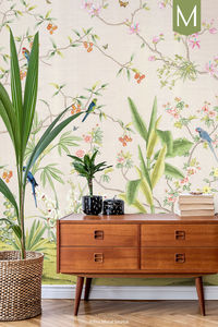 Enchanted Garden is a chinoiserie mural that charms with colorful birds, vibrant blooming trees, and tropical plants.