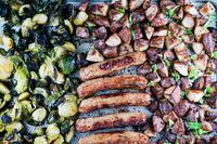 This easy 7 ingredient dinner is made on a single sheet pan with roasted sausages, potatoes, and Brussels sprouts! The perfect simple dinner for a busy night. #dinner #kidfriendly #quickandeasy