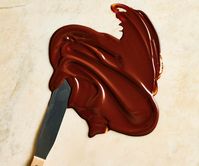 Step-by-step guide to tempering chocolate on the stove. Plus how to temper chocolate in the microwave.