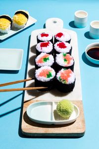 Save this creative DIY project to learn how to make pom-pom sushi.