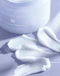 This nourishing cleansing balm from Naturium melts into skin with a sorbet-like texture that emulsifies upon contact with the skin. Formulated with purple ginseng, plant-based esters and a deeply hydrating blend of linoleic-rich oils that help to dissolve makeup, oil, sunscreen and other impurities. Infused with clean ingredients that leave skin feeling clean, soft, smooth and nourished. Flower and fruit extracts provide gentle moisturization that seeps into the skin. Use as a creamy and luxurio