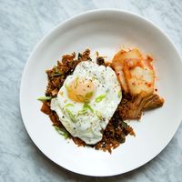 This supereasy Kimchi-and-Kale Fried Rice recipe has just three simple steps. Learn how to make it at Food & Wine.