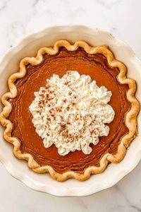 This healthy pumpkin pie recipe is absolutely delicious and quite easy to make! It's perfect for a holiday dinner or party.