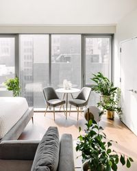 At Home with Design Crew: Neutral Meets Glam in a Small-Space Studio Apartment in NYC - Front + Main