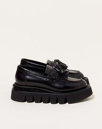 Tassle loafer in glossy all-black cow leather with wedge calf hair heel on platform vibram sole.Fit: Japanese sizing, see conversionMaterial: Cow leather, vibram soleOrigin: JapanWhy we Covet: Transcendence through craftsmanship