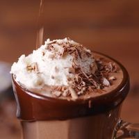 Homemade hot chocolate is super fudgy and wayyyy more delish than packaged mix. It's also insanely easy to make on the stovetop. Top off each mug with a big scoop of vanilla ice cream and you're in for a dangerously decadent treat. Get the recipe at Delis