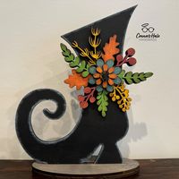 This rustic Halloween hand painted witch boot and floral accents would look wonderful on any shelf, mantle or tabletop as part of your fall decor.  Makes a great gift for mom, friend or coworker. Measures 10"h x 8"w Laser cut from premium 1/4" Baltic birch wood and hand painted.  Not meant for outdoor use.