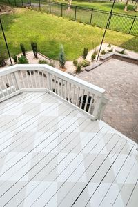 This mom of 3 undertook the job of painting her family's old and chippy deck. With just a little paint and tape, she transformed the old deck into a European-inspired harlequin deck that is the focal point of the backyard. Check out now!