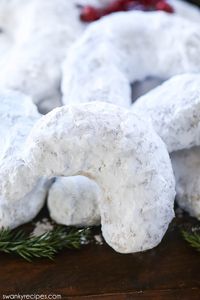 Crescent Cookies - Classic almond crescent cookies with powdered sugar. A decadent Christmas cookie recipe to make for the holiday baking season.