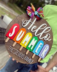 "Farmhouse 16\" style sign with 3D wooden letters cut with a laser Hello Summer round door hanger with Popsicles The background is Stained beautifully brown. beautiful bright colors and bow, comes with a saw tooth hanger on the back"