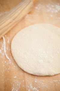 Learn How To Make Homemade Pizza Dough! This step by step guide will show you how easy it is to make healthy pizza dough at home. This dough makes the best pizza. I think it's fun to roll pizza dough out by hand! #pizza #pizzadough #howtomake #homemade