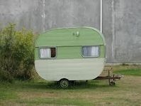 Love the green color of this vintage camper