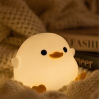 Illuminate your surroundings with adorable charm using our Rechargeable Duck Night Light. This delightful chibi duck light brings a touch of whimsy to any space, featuring a squishy and soft silicone construction. With a convenient 20-minute timer and two light modes, you can create the perfect ambiance for relaxation or play. ◆ Playful Design: Embrace the cuteness of a chibi duck with this charming night light that adds a joyful touch to your room decor. ◆ Customizable Lightin Choose between tw