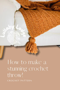 Learn how to make this stunning blanket, crocheted in mega chunky yarn.  The herringbone double crochet stitch is very easy to learn.  This crochet pattern by Lullaby Lodge includes a video tutorial.  Quick and easy project, super chunky yarn works up really fast to make this gorgeous blanket.