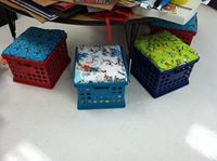 Plastic crate seats with board under the cloth & Dr. Seuss fabric so cute!