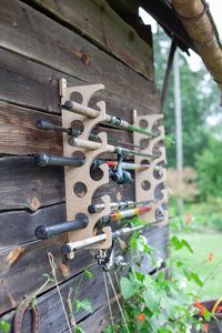 This fishing rod wall display / rack organizer will store 10 rods of all varieties. Made from high quality baltic birch plywood. The fishing rod stand is designed for wall or ceiling mounting. Material allows you to place the stand in both heated rooms and non-heated rooms. Very easy to mount with only 2 screws per one stand. Being sold as a pair. Dimensions: Height -  23.11 inches (58.7 cm) Depth - 5.9 inches (15cm) Thickness of plywood - 0.35 inches (9mm ) Hole diameter - 1.96 inches (5cm) Thi