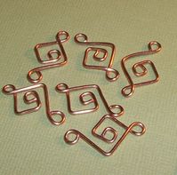 6  lightly hammered, Open diamond Swirl Wire connections. Handmade approx 10mm square. I have more headpins of different styles here as well http://www.etsy.com/shop/wickedlywired?section_id=6973588