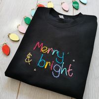 A cosy sweater for festive fun. A soft fleece back, black sweater with colourful hand embroidery. Metallic details for festive sparkle. Loose fitting and long in the body. A small is a UK 12 and a large a 16. Any sizing questions please feel free to contact me. Machine wash as normal