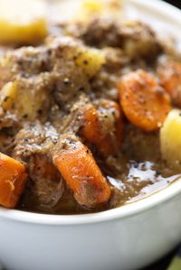 This slow cooker beef stew is so thick and hearty! Your house will smell amazing as this cooks in the crock pot!