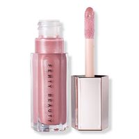 FENTY BEAUTY by Rihanna's Gloss Bomb Universal Lip Luminizer is the ultimate gotta-have-it lip gloss with explosive shine that feels as good as it looks-the essential finishing touch to any look.