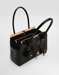 Crocodile-print calfskin Marlene handbag: Black Crocodile-print calfskin handles Gold-plated metal turn-lock fastening Nappa leather lining Item comes with a branded dust bag Measurements: H20.5 x W30 x D12 cm Made in Italy