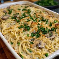 Chicken Tetrazzini is a creamy and satisfying pasta dish that's perfect for using up a shredded Costco rotisserie chicken. This dish combines mushrooms,