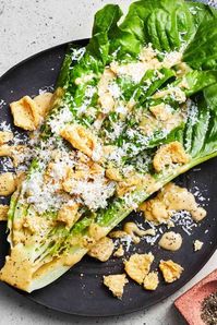 In this episode of F&W Cooks, chef Claudette Zepeda shares her recipe for Baja-Style Caesar Salad, which gets a twist from swapping Parmesan out for Cotija cheese and using chicharrones instead of croutons.