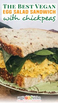 This is the best vegan “egg” salad sandwich you will ever eat! The recipe mixes up super fast and is made with mashed up canned chickpeas (garbanzos), vegan mayo, and the typical egg salad seasonings. Serve this chickpea “egg” salad sandwich on a crusty bread of choice. You will have all the texture, color, and flavor of a traditional egg salad sandwich; and you didn’t even use eggs! | @veggiefunkitchen #howtomakeveganeggsalad #easyveganlunchideas