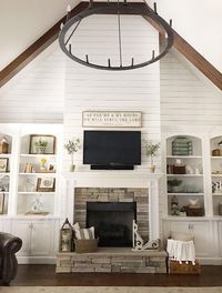 Living room Shiplap Accent Wall. Living room with vaulted ceiling, exposed beam and Shiplap Accent Wall above fireplace and built ins. Living room Shiplap Accent Wall #Livingroom #ShiplapAccentWall #Shiplap #Accentwall #Vaultedceiling #exposedbeam #Shiplapfireplace #shiplapbuiltins Beautiful Homes of Instagram @ourvintagenest