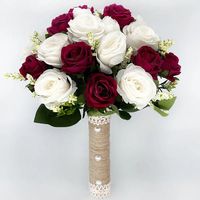 Elevate your wedding experience with the Bride Bridesmaid Wedding Bouquet, a stunning fusion of silk ribbon roses and artificial holding flowers that embodies the beauty of your love story. Let this bouquet be a symbol of your joy, commitment, and the everlasting romance that unites you on your wedding day. Material: Polyester, Rayon, Acrylic, Viscose Item Width: 7.87inch Item Height: 9.84inch Item Length: 9.84inch *Note Delivery Time: Due to the current global crisis (COVID-19), shipping time m