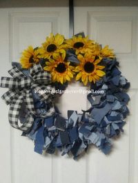 Hand tied denim sunflower wreath made from repurposed jeans. Features bright yellow sunflowers and a black and white plaid bow. Perfect for every day. This is a handmade item so there may be slight variations to the photo. To preserve the beauty of the wreath it should be hung protected from the elements and not in direct sunlight to minimize fading. Please contact me with any issues regarding your order and give me an opportunity to correct the situation before leaving negative feedback. I stri