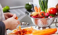 Woman cutting vegetables 465x285