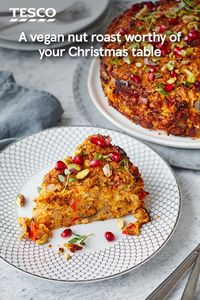 Try this hearty centrepiece for a luxurious vegan Christmas Dinner main. Butternut, aubergine, peppers and pistachios are roasted with traditional herbs to make a rich, savoury roast with a sweet and crunchy pomegranate topping. | Tesco