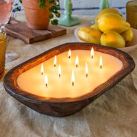 PRICES MAY VARY. 100% Cotton Wicks - Our farmhouse dough bowl candle has 10 wicks that are free of nasty lead; Dough bowl candles for table centerpiece or entryway wood bowl candle decor Longer Burn Time Than Competition - Heart dough bowl candle table centerpiece with burn time of approximately 40 hours; Burn time varies on each bowl making no two identical Go Green with Soy Blend Wax - Better for the environment and for your health, our 10x14 inch brown dough bowl candle boat makes a perfect farmhouse bowl; Soy dough bowl candle blend for your coffee table Give the Perfect Gift - Hand-carved wooden bowl candle make the perfect candlebowl housewarming gift; Dough bowl candle with 1.5-2" depth is reusable as decor for your watches, keys, coins, etc. Made in the USA, by a USA company - Wood