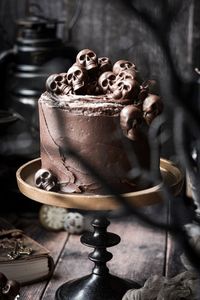 Ginger chocolate cake with chocolate skulls for Halloween.