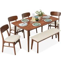 The 6-Piece Dining Set showcases a captivating Mid Century Modern design, capturing the essence of the mid-20th century style. The dining table boasts a beautiful wood grain tabletop, offering a touch of natural elegance to any space. The set includes four chairs, each featuring ergonomically curved backrests and a matching bench. Versatile and comfortable, each seat is upholstered with padded seats. Crafted with durability in mind, the table is constructed with solid rubberwood, while the chair