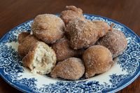 How to Make Donuts From Pancake Mix....This is dangerous! They taste like state fair fried goodness! I used powdered sugar and had to push the plate away so that I would stop munching!