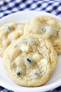 Lemon Blueberry Pudding Cookies on twopeasandtheirpod.com. Ingredients: sugar, lemon zest, butter, brown sugar, instant lemon pudding mix, eggs, vanilla, flour, baking soda, salt, dried blueberries, white chocolate chips