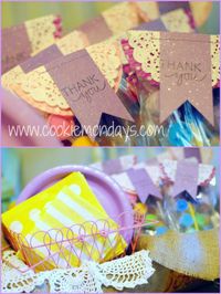 love the favors with cupcake wrapper doily and sewn bunting...