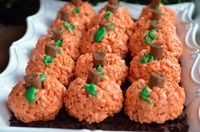 Cute and easy Halloween Rice Krispy pumpkin treats.