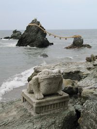 Meoto Iwa This pair of small sea rocks has been "wed" using rope and ancient Shinto tradition