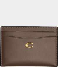 From COACH, this Leather Card Case features:Refined calf leatherFive credit card slotsApprox. 4.25" (L) x 3" (H)Imported.