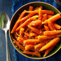 Brown Sugar-Glazed Baby Carrots Recipe -When things get hectic, these delicious glazed carrots are my "rescue me" side dish because they cook while I'm preparing other parts of the meal. Plus, they're made in the slow cooker so the oven is free for other things. —Anndrea Bailey, Huntington Beach, California