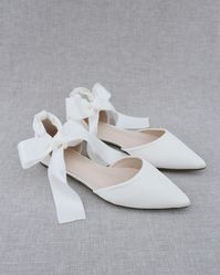 Satin pointy toe flats with satin ankle tie or ballerina lace up. Comfortable wedding shoes throughout ceremony and reception to dance the night away. *** YOU CAN ALSO CHOOSE STYLE OF ANKLE STRAP AT CHECKOUT*** DETAILS: UPPER: Synthetic upper and lining MATERIALS: Manmade outsole ORIGIN: Imported STYLE NAME: BELLA